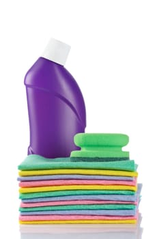 Plastic detergent bottle and sponges