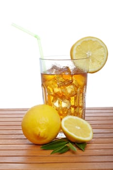 Glass of ice tea with lemon