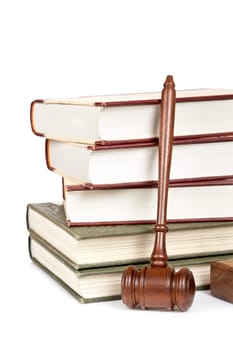 Wooden gavel and law books