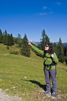 Girl with the backpack indicating