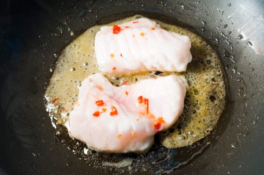 monk fish in wok