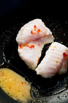 monk fish in wok