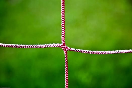 Closeup Of Red Soccer Net String