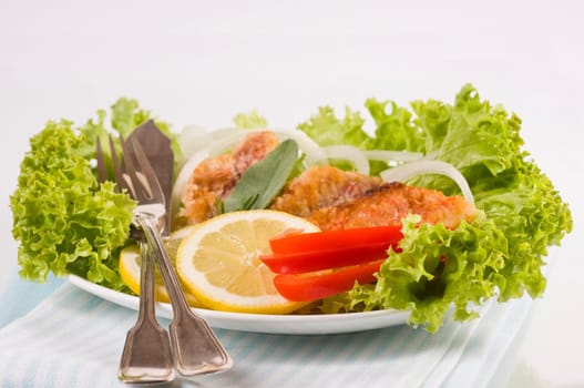 fried mullet fillets with salad