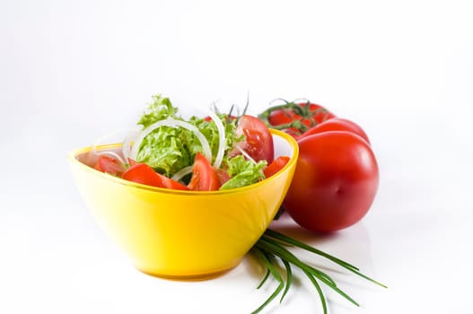 mixed salad in yellow bowl