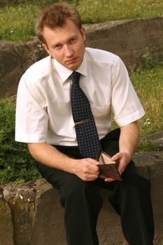 man with empty wallet