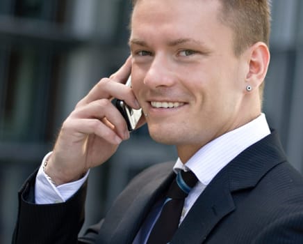 Smiling Corporate Man With Cell-Phone