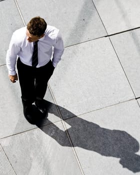 Corporate Man On The Sidewalk
