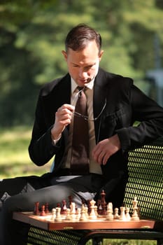 businessman playing chess