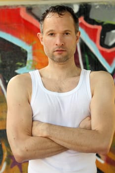 man in undershirt