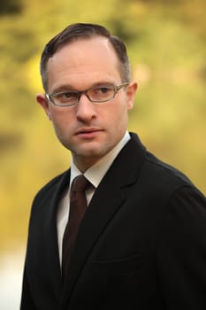 portrait of businessman wearing glasses