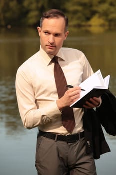 businessman making notes