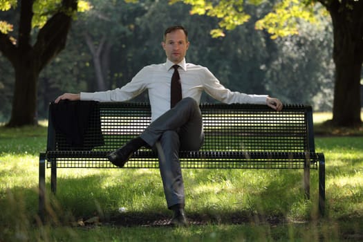 businessman sitting on the beach