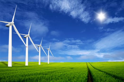 Windmills in a green field
