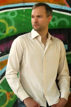 fashion man at the wall