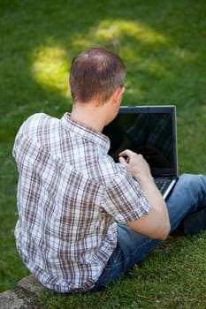 working with laptop outdoor