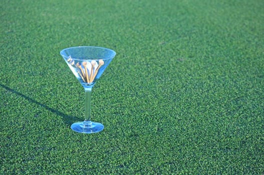 golf martini on grass with copy space