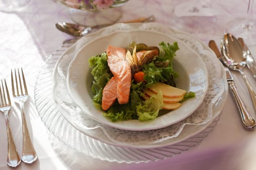 Salmon with salad as an appetizer