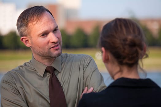 Man and woman in conversation