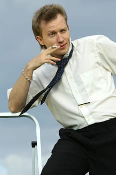 Man smoking outdoors