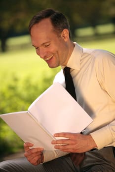 Man reads magazine