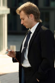 man looking at the clock