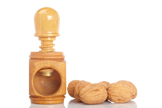Walnuts and wood nutcracker