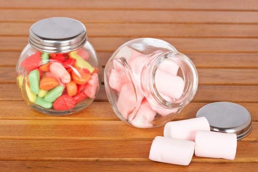 Colorful candies and pink marshmallows