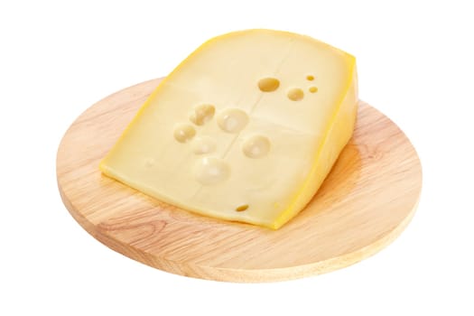 Cheese on wooden dish