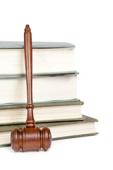 Wooden gavel and law books