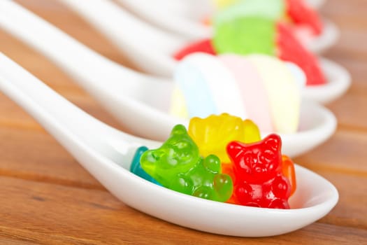 Candies in the spoons