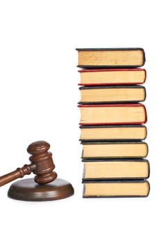 Wooden gavel and old law books