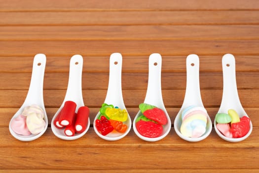 Candies in the spoons