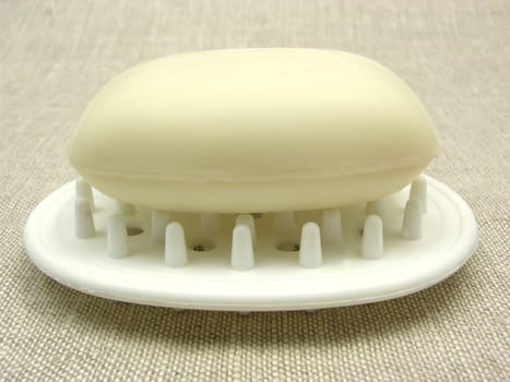 Beige soap on soap tray