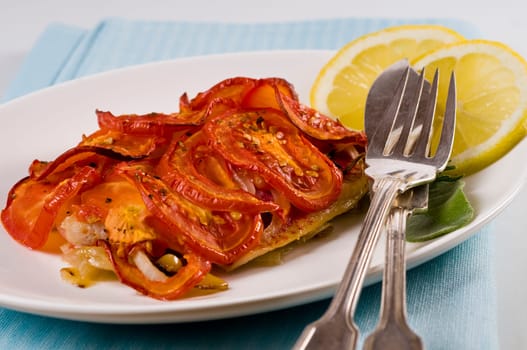 Mullet fillet gratinated with tomatoes
