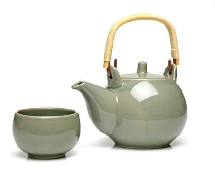 Ceramic teapot and a tea cup