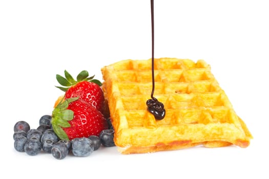 Poured syrup on waffles