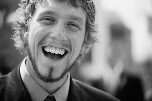 A man laughs