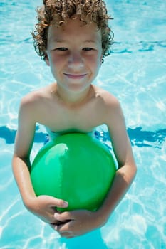 Boy in swimming pool