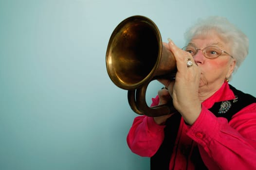 Woman plays horn