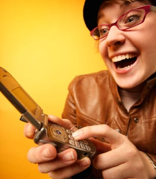 Woman dials cell phone