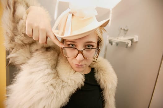 Woman tries on a fur coat