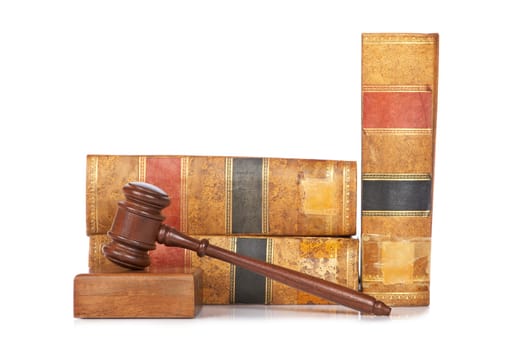 Wooden gavel and old law books