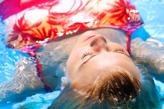 Woman floating in water