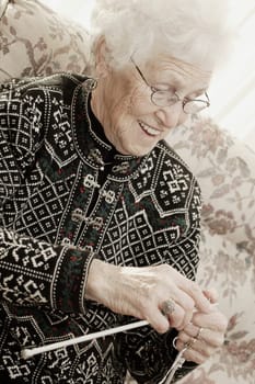 Elderly lady knitting