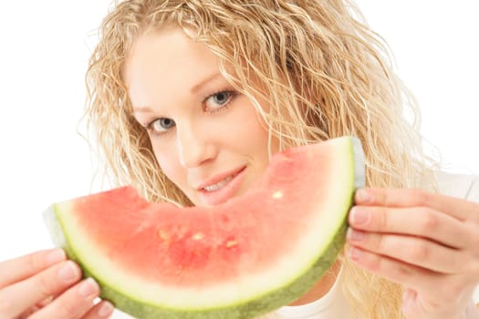 Woman holding slice of watermelon