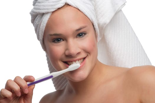 Woman brushing teeth