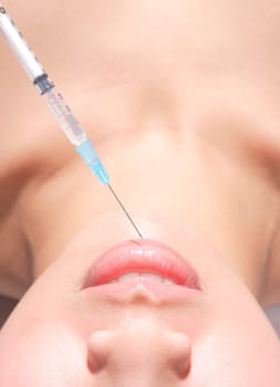 Woman gets collagen injections