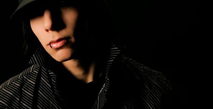 Teenager with lip piercing