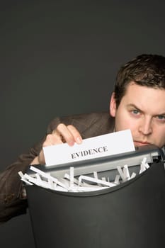 Man shredding a document